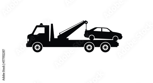 A black silhouette illustration of a tow truck lifting a car