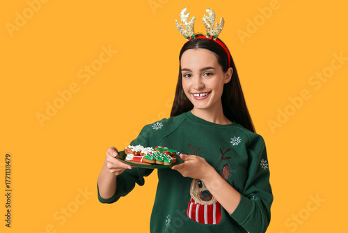Young woman with tasty Chri...
