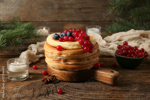Stack of golden pancakes to...
