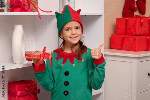 Cute little girl in elf cos...