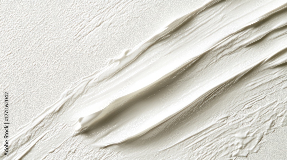 Obraz premium Cream paint strokes on canvas. Abstract background. Possible use Product photography, design inspiration