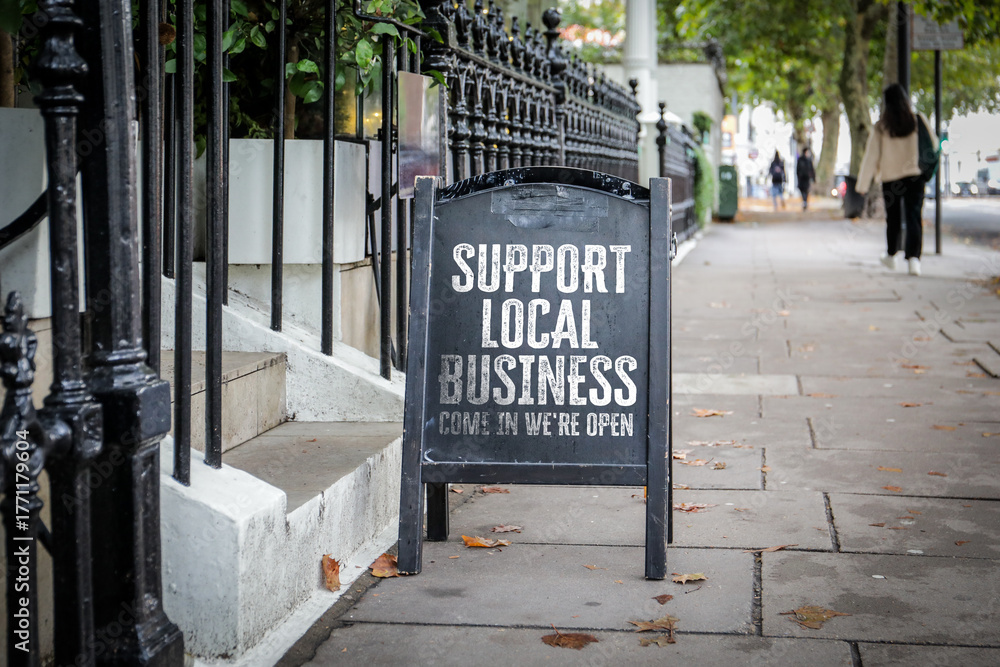 Φωτογραφία Support Local Business Sign on City Street