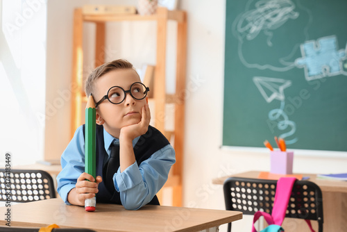 Thoughtful little schoolboy...