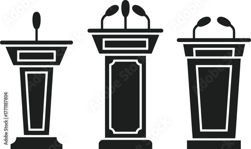 Set of three podiums with microphones, representing public speaking and debate
