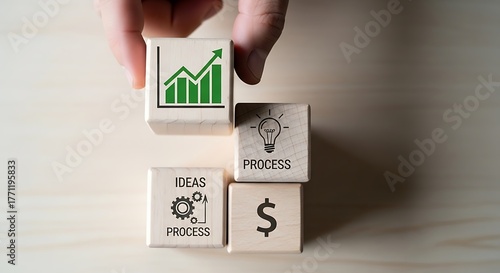 hand holding a wooden block