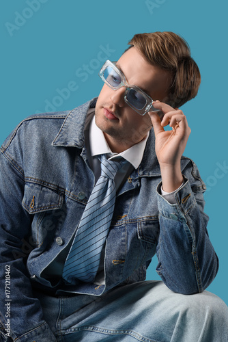 Stylish young man in denim ...
