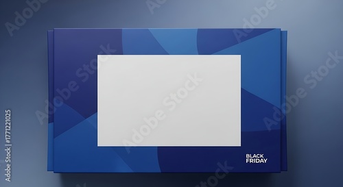 Black Friday Package: A top-down shot of a stylized package design, with sleek dark blue geometric patterns encompassing a bright white space.