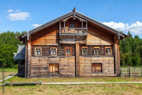 Old Russian Log House with Small Windows