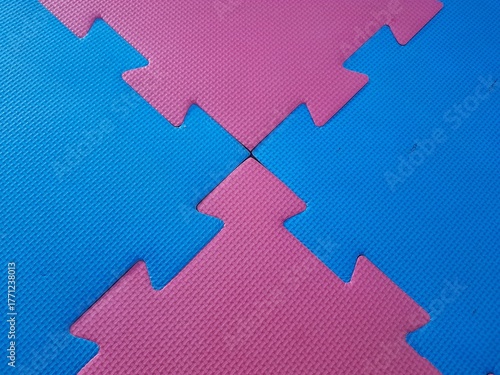 Foam floor puzzle mats texture, colorful floor mat background. Colorful kids baby floor foam mat puzzle