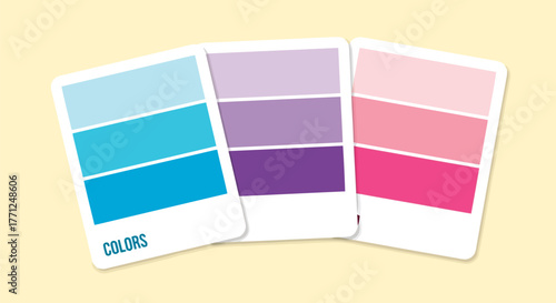 Three color swatch cards displaying shades of blue, purple, and pink on a light yellow background