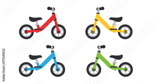 Colorful balance bikes in red yellow blue and green shades