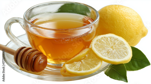A cup of tea with lemon slices and honey dipper on a saucer with a whole lemon and green leaves