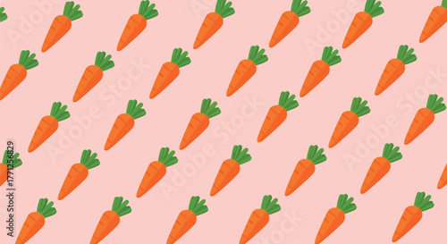 Seamless pattern of fresh carrots with green tops on a pink background