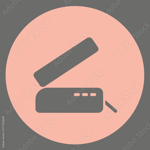 Digital device for pressing hair in modern design on pastel background  