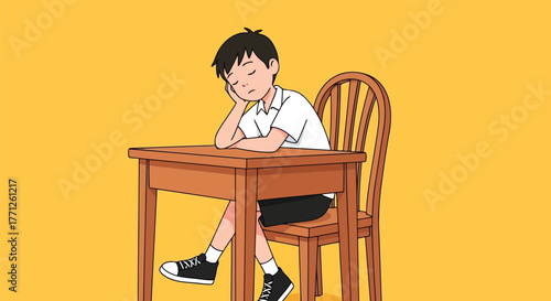 Boy sleeping at a desk in a classroom, looking bored and tired