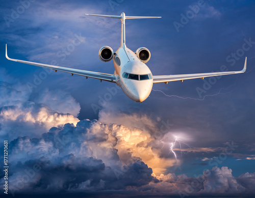 jetliner soaring above glowing storm clouds
