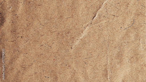 Old brown vintage paper texture background. Background of brown kraft paper or cardboard texture. Abstract pattern of beige rough carton, old paper sheet. 