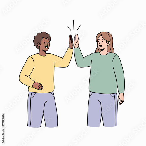 Diverse partners celebrating success with a high-five gesture