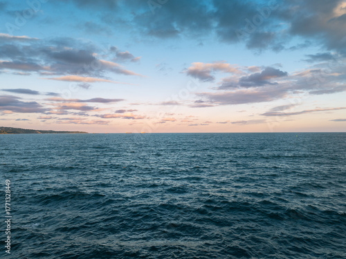 Aerial view over the sea waves, with Reflective Ripple surface
