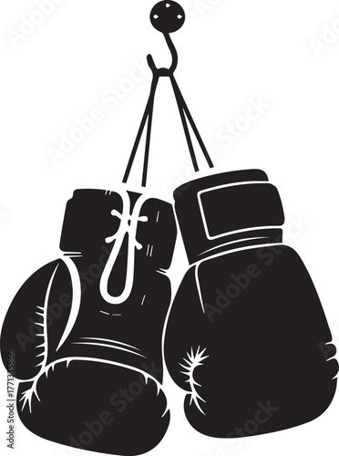 Classic boxing gloves hanging from hook symbolizing fight and championship