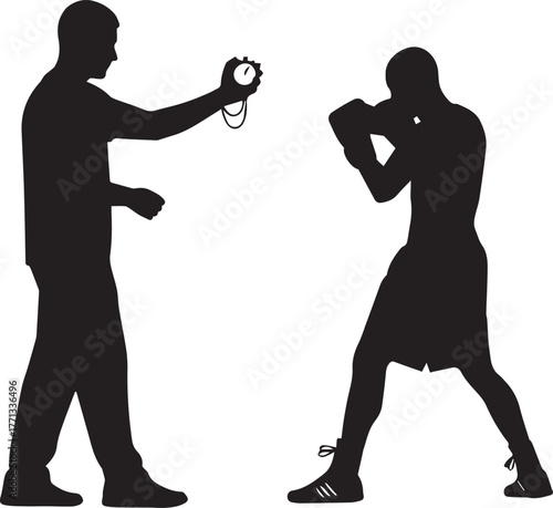 Boxing trainer with stopwatch watches boxer in defensive stance silhouette training session