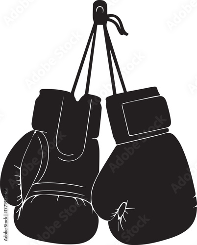 Pair of black boxing gloves hanging ready for intense training and championship fights