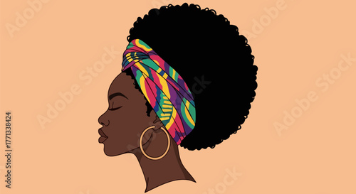 African woman with afro and headwrap in profile view