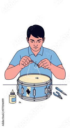 Man repairing a snare drum.