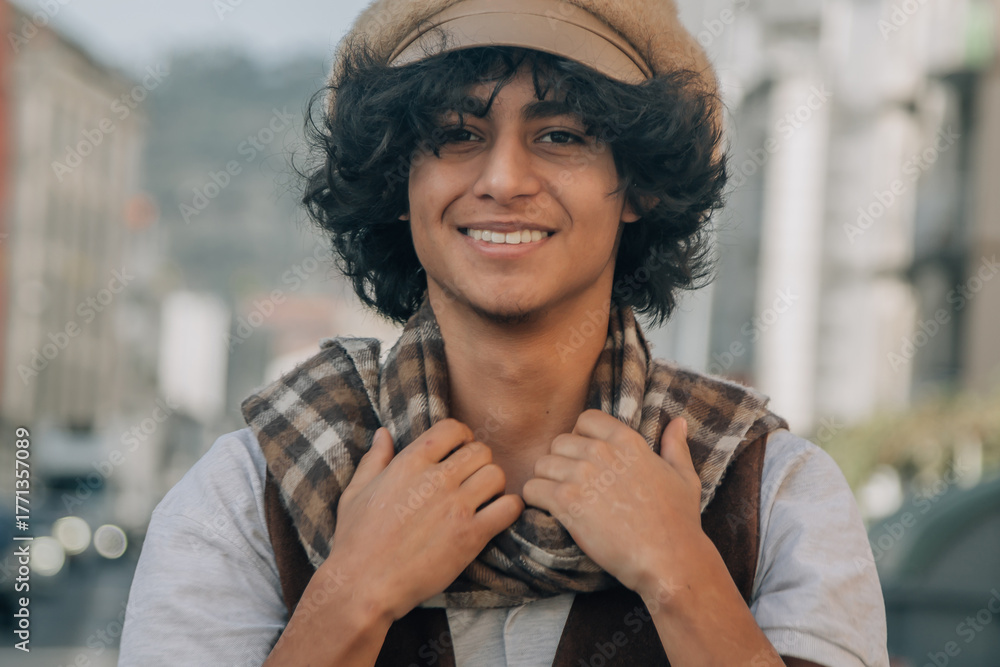 Fototapeta premium young fashion man holds his scarf