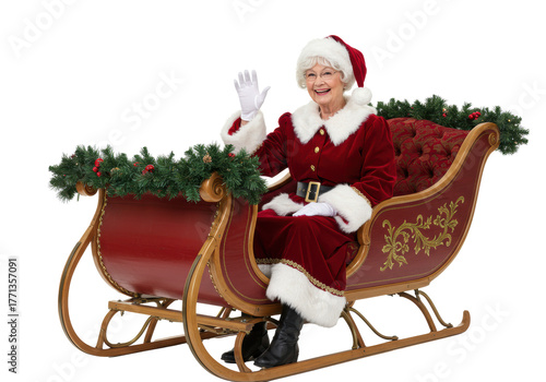 Senior caucasian mrs. claus in red velvet dress and bonnet, smiling and waving from an ornate sleigh against a transparent studio background, concept of traditional holiday joy