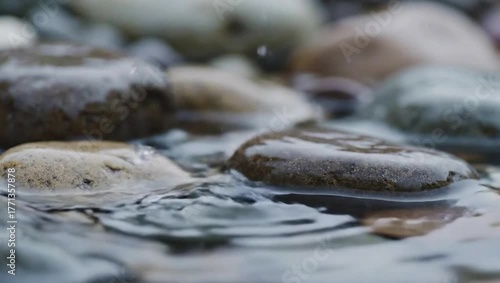 Water droplets falling on rocks nature scene slow motion footage stock video for relaxation and meditation