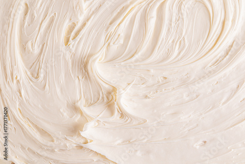Delicate swirls of vanilla cream to decorate pastries. The texture of creamy pastry cream. Copy of the space. texture sample. selective focus.