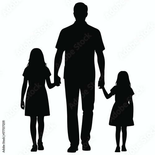 Silhouette of a father holding hands with his two young daughters walking together