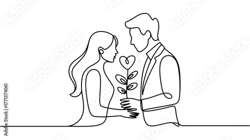 A man and a woman exchange a heart-shaped flower in a loving gesture.