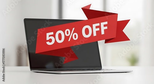 A laptop displays a red ribbon with 