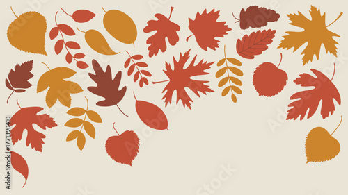 Autumn leaves in various shades of orange and brown arranged on a light beige background in a pattern