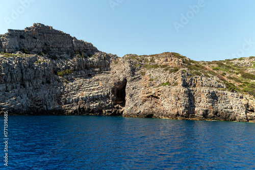 Scenic coastal rock formations along the crystalline waters of Crete Greece