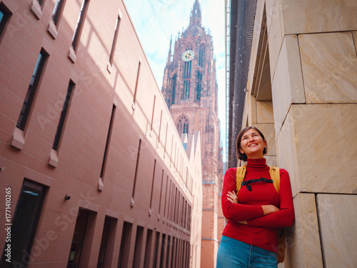 woman walks through old town of Frankfurt