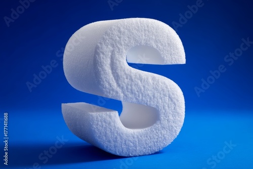 Wallpaper Mural Textured styrofoam letter s on vibrant blue background. Torontodigital.ca