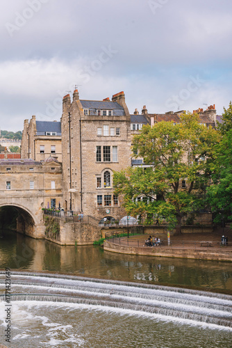 Pulteney Bridge in wonderful day, perfect for sightseeing, as viewed from the Parade Gardens, Bath, England.