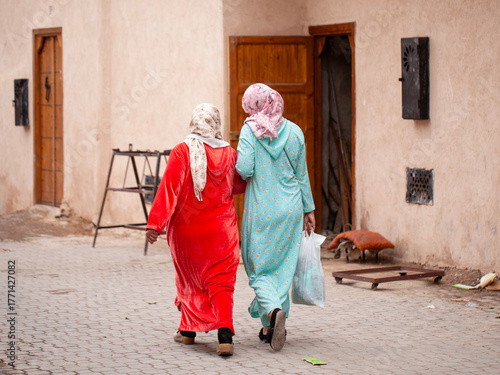 Two women walking in Marrakech (Morocco).