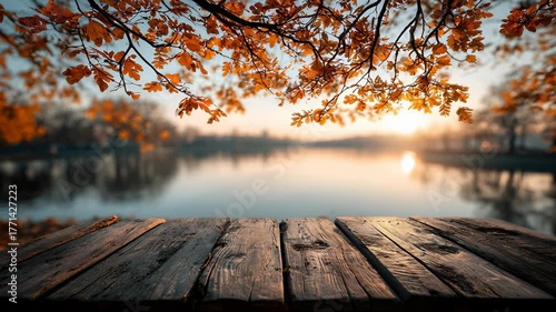 Rustic Wooden Table with Autumn Maple Leaves: Perfect Empty Surface for Product Display Against a Blurry Fall Park Background