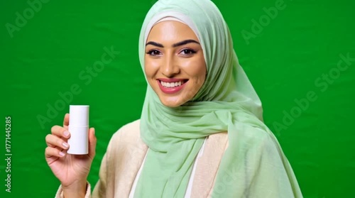 Elegant Female Model Holding Beauty Packaging Product
