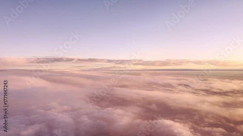 Cinematic View Of Colorful Clouds At Sunset, With The Moon Rising Above
