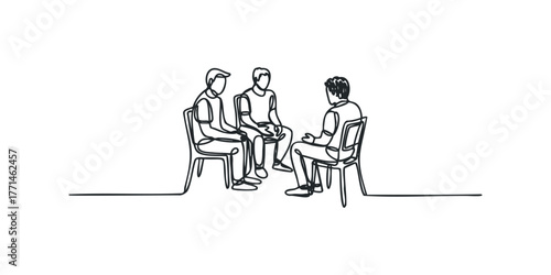 Three people in conversation sitting on chairs