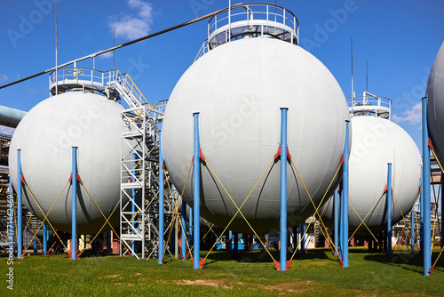 Industrial gas storage tank spherical gasholder. Gas storage tank. Spherical gas tank in petrochemical plant. Above ground storage tank. Natural gas storage industry.