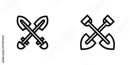 A black shovel icon isolated on a white background is also symbolized by crossed shovels