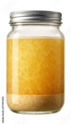 Liquid yeast culture with a cloudy suspension and sediment settled at the bottom.
