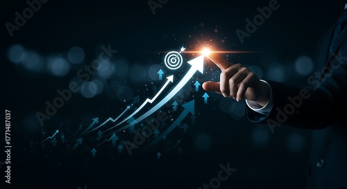 Digital transformation concept. A man interacts with a futuristic hologram showing business growth charts, aiming for future success and innovation