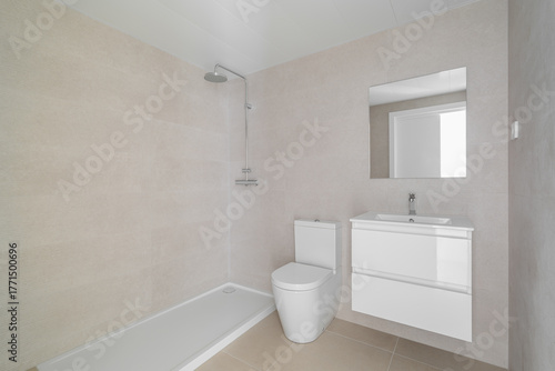 Wallpaper Mural Modern bathroom with a shower, toilet, and sink. Neutral color scheme with light tiles and a large mirror. Clean and minimalist design. Torontodigital.ca